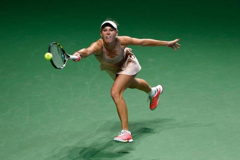  Turneul Campioanelor: Caroline Wozniacki a invins-o pe Maria Sharapova, dupa un meci maraton