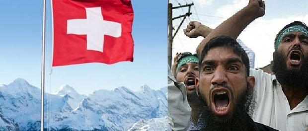  Tupeu: Imigranții musulmani din Elveția cer modificarea drapelului. Se simt jigniți de crucea de pe el