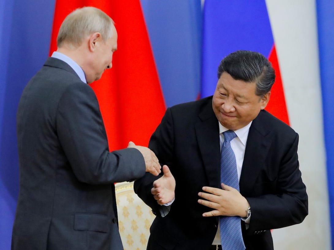  Beijingul şi Moscova denunţă într-un rar editorial comun summitul democraţiei al lui Biden