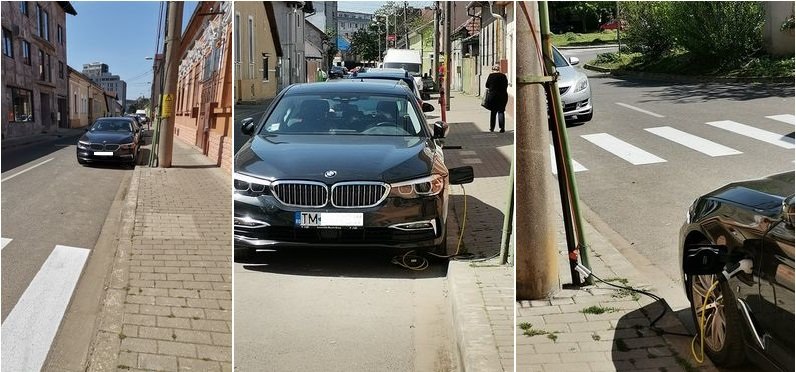  Un șofer, prins când își alimenta BMW-ul cu curent de la un stâlp stradal