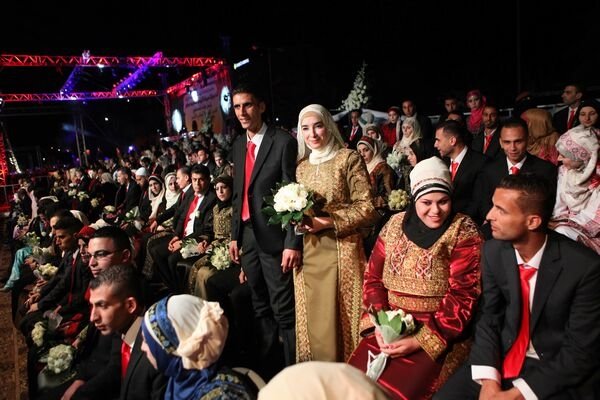  Aproximativ 600 de palestinieni s-au căsătorit în cadrul unei ceremonii colective