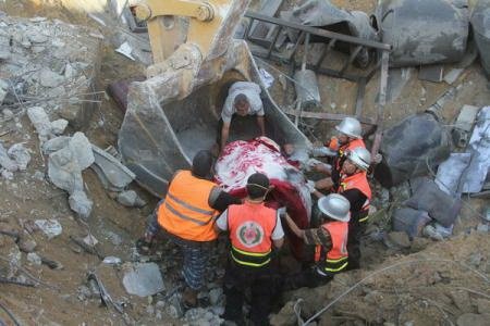  Cel puţin 76 de cadavre, descoperite între dărâmături în timpul armistiţiului din Fâşia Gaza