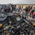 Incendiul uriaş din tabăra de la Rafah este posibil să se fi declanşat din cauza unui depozit de muniţii din apropiere, spune Israelul